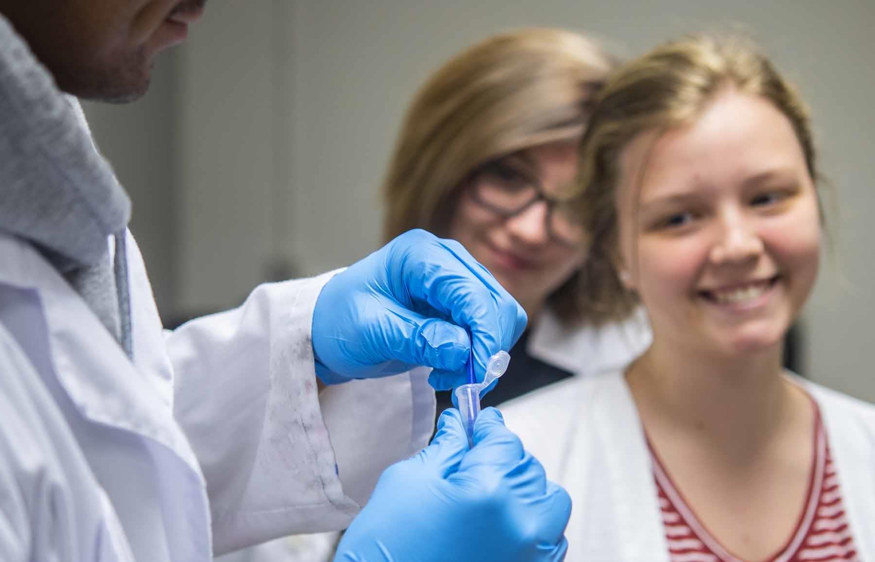 image of a student working with a molecular sample